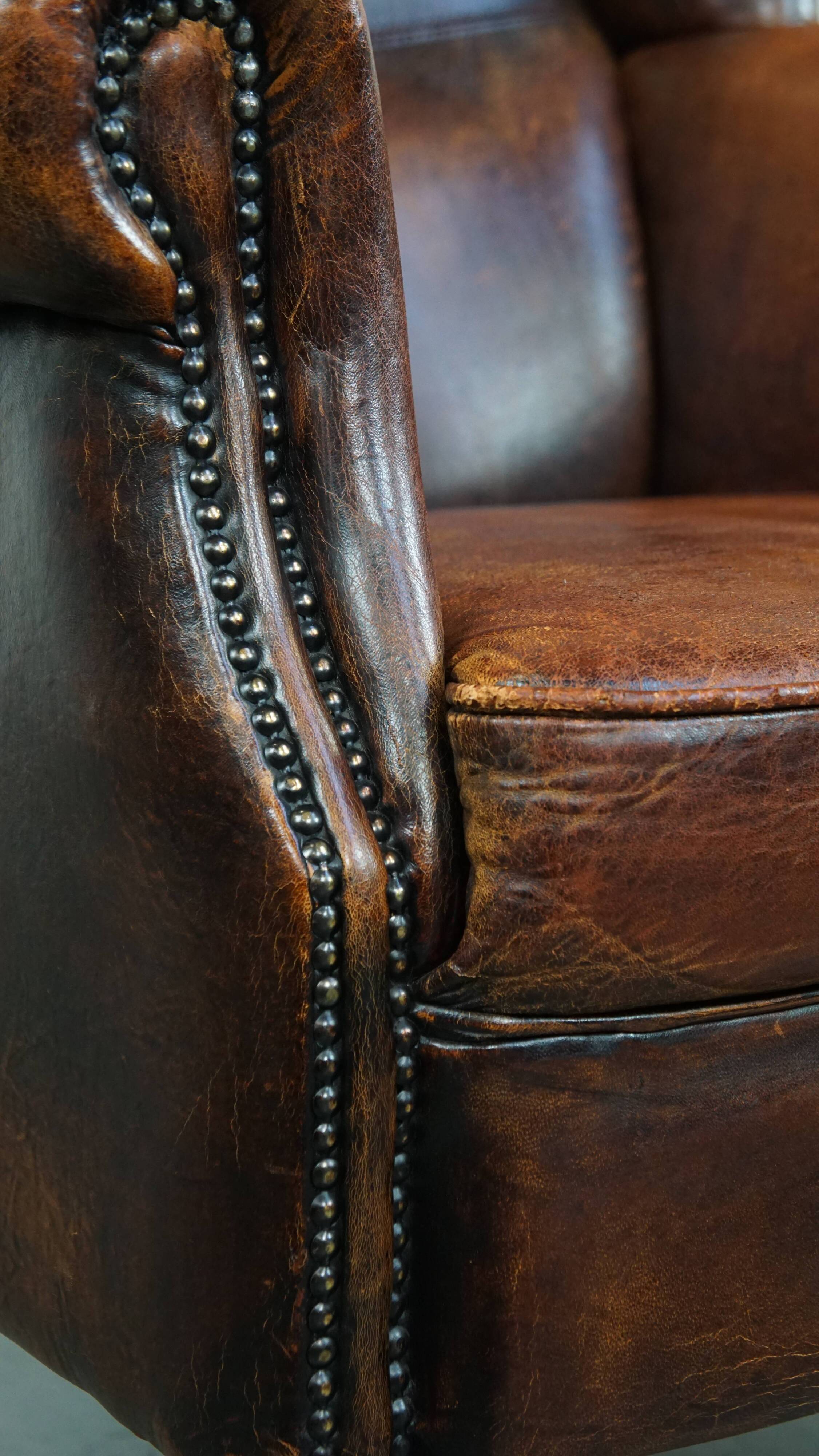 Vintage sheep leather wingback chair