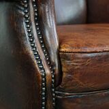 Vintage sheep leather wingback chair