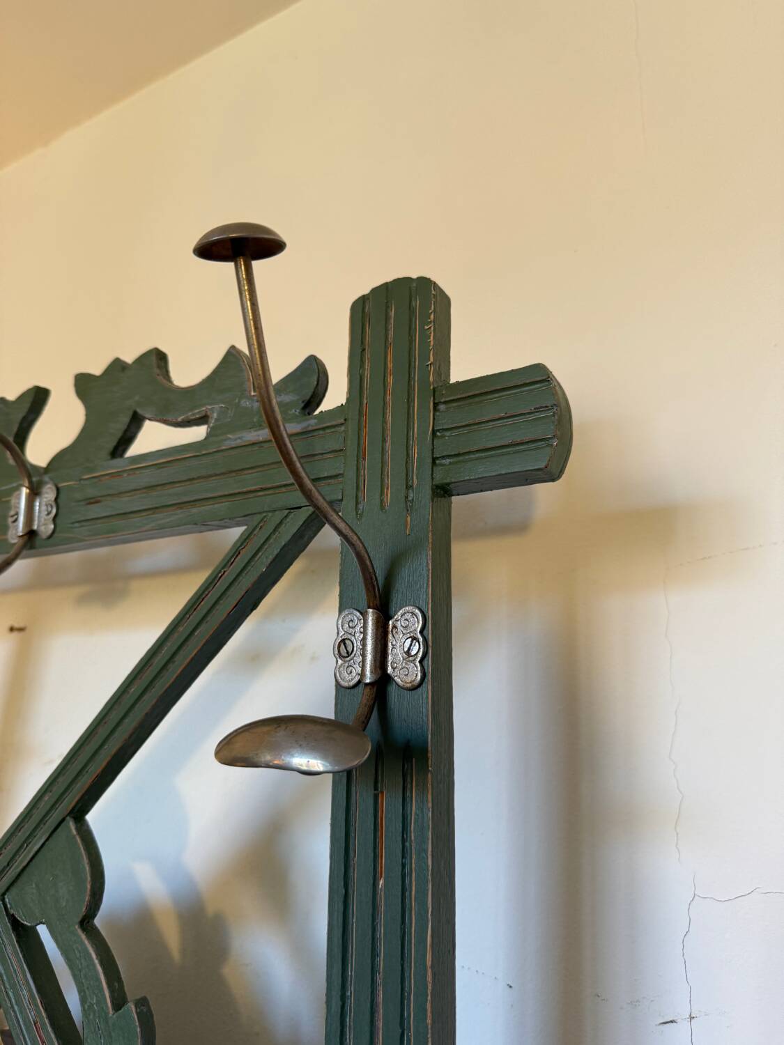 Art Deco coat rack in green patinated wood