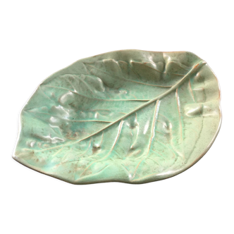 Embossed leaf pocket emptier