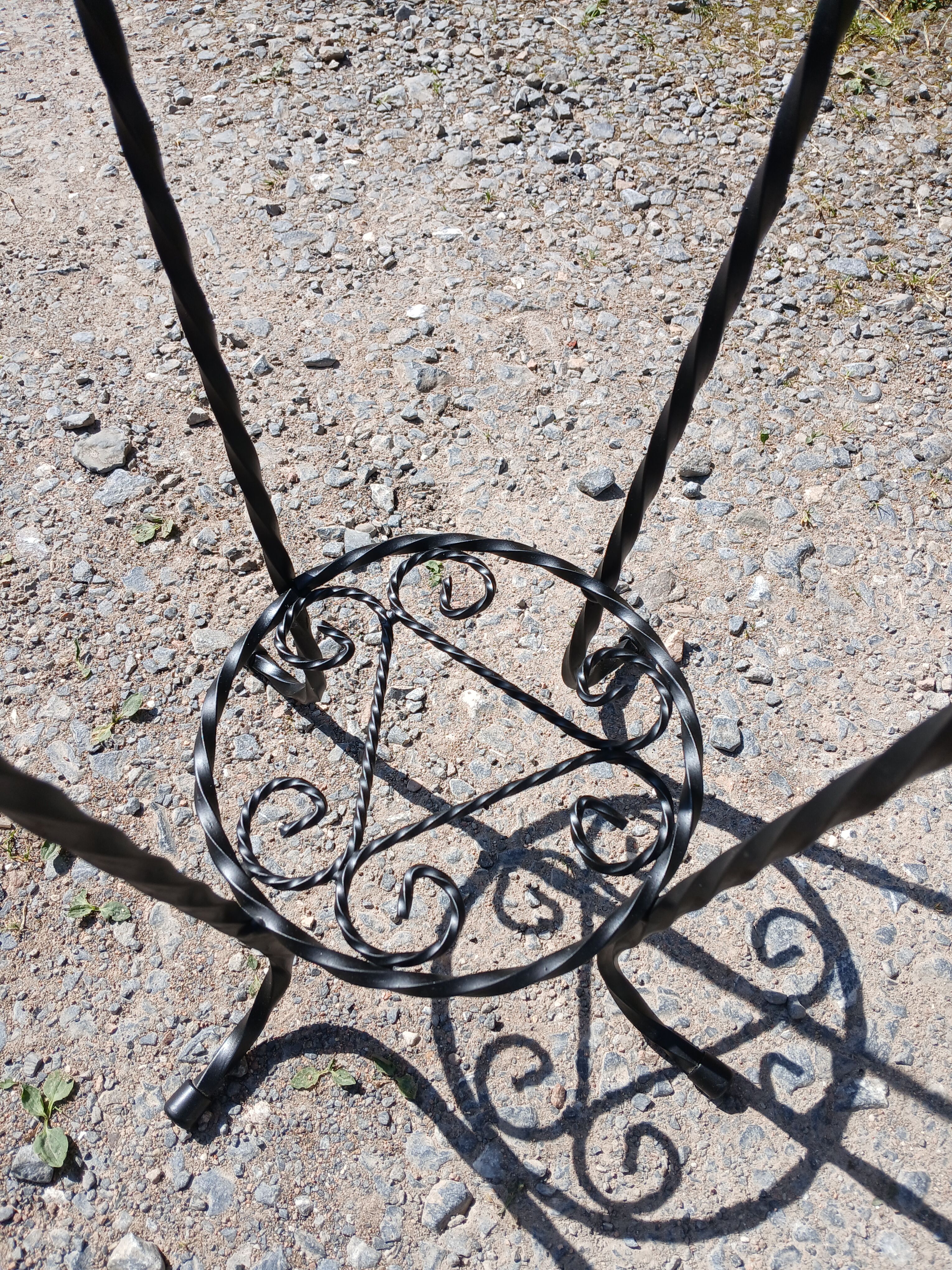 Vintage plant stand with Vallauris pottery.