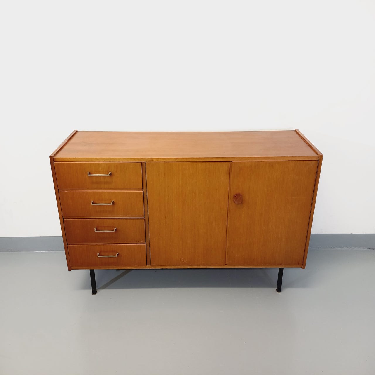 Vintage teak and black metal row from the 60s