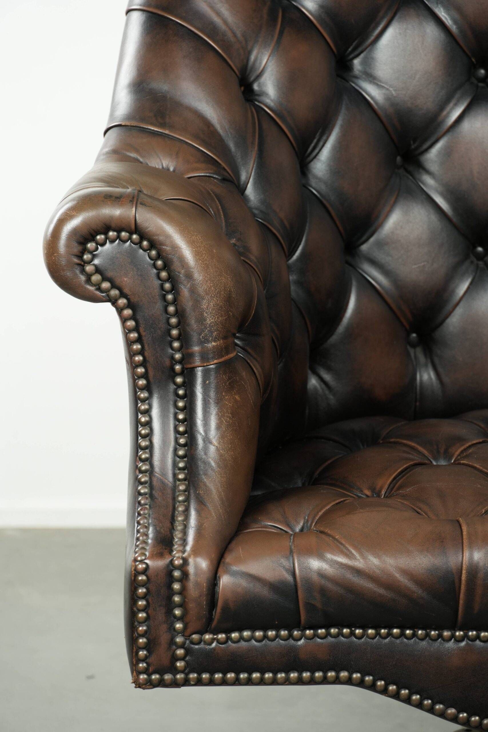 Vintage Chesterfield office chair with decorative nails in English style