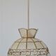 Mother-of-pearl and brass suspension