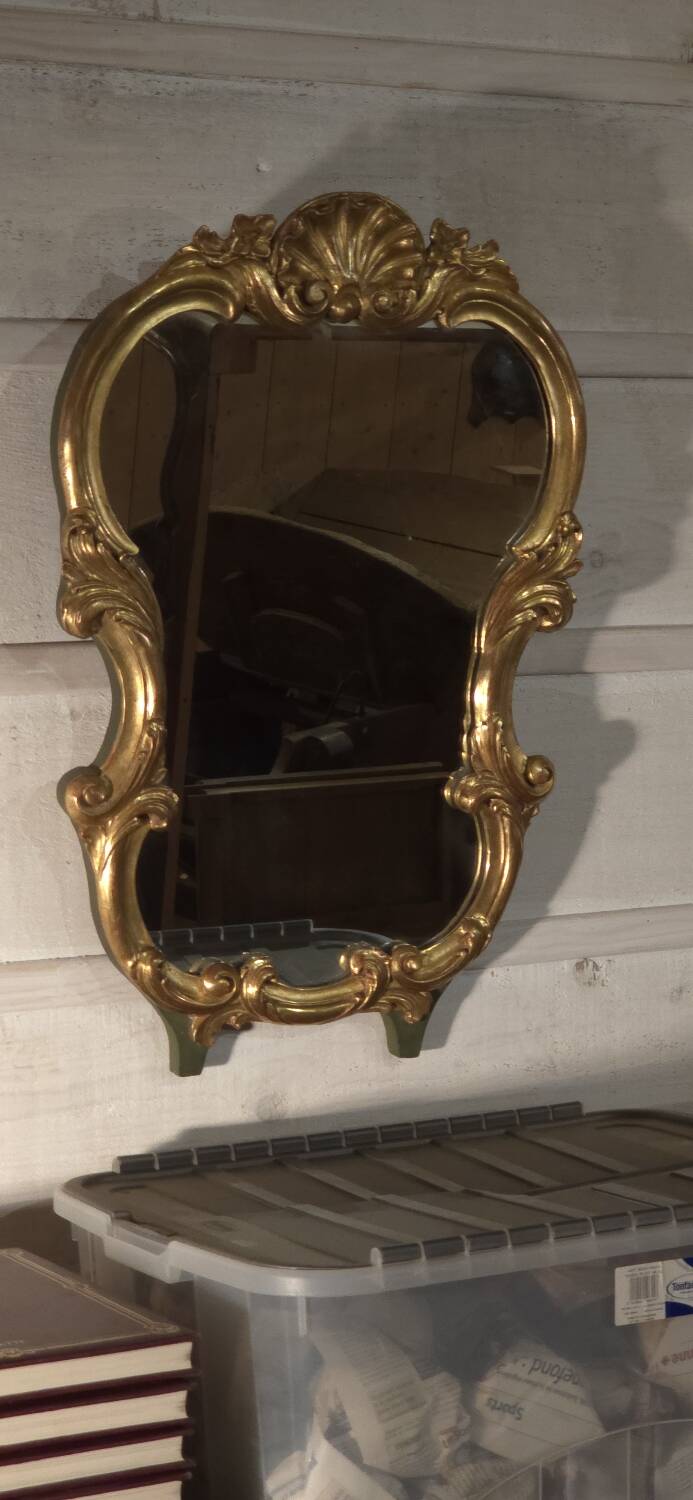 Golden wood mirror.