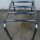 Hotel luggage rack, in chrome steel. The 50's