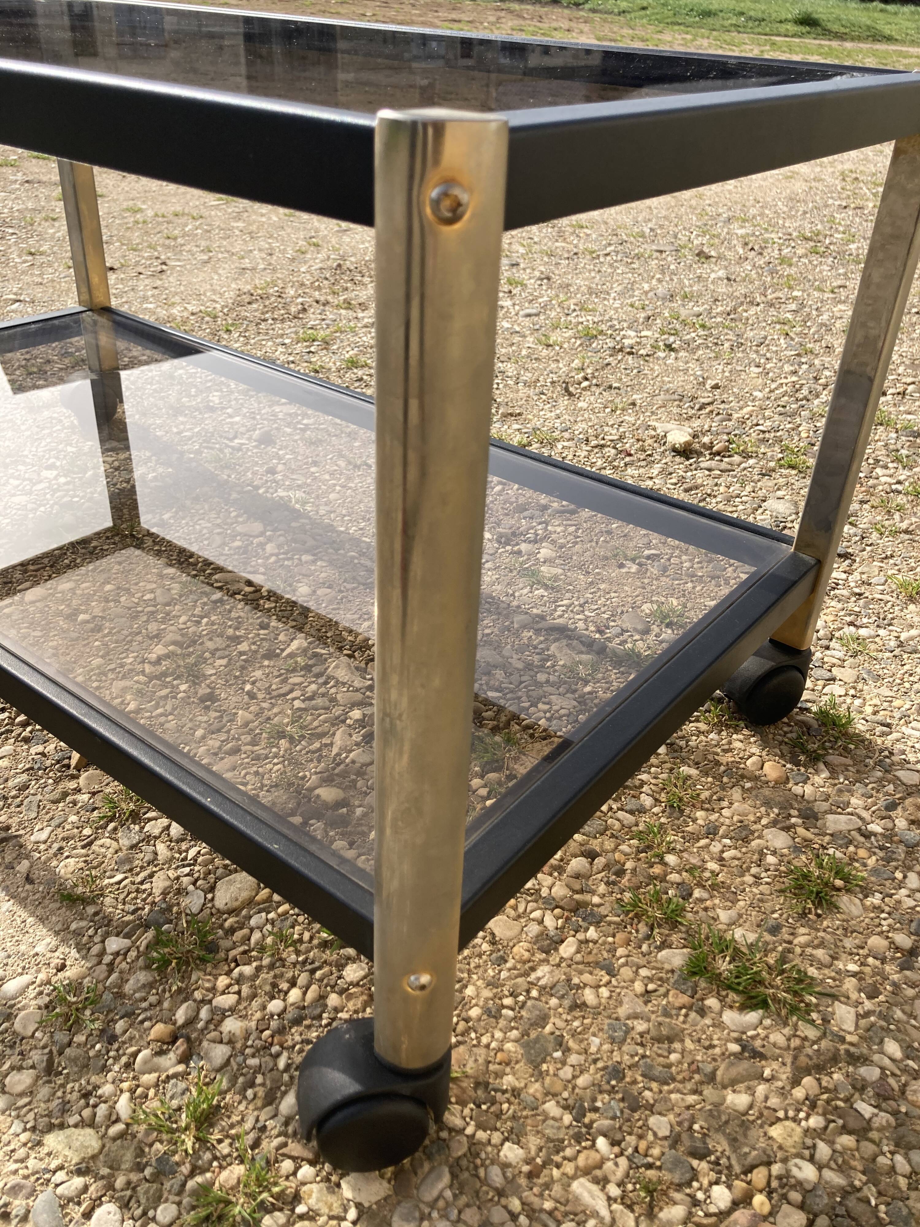 Glass coffee table on wheels