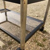 Glass coffee table on wheels