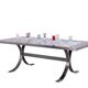 Polished metal and ceramic dining table. 1970s.