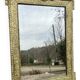 19th-century antique mirror in carved gilded wood, Napoleon style.