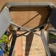 Pedestal table with airplane wing legs