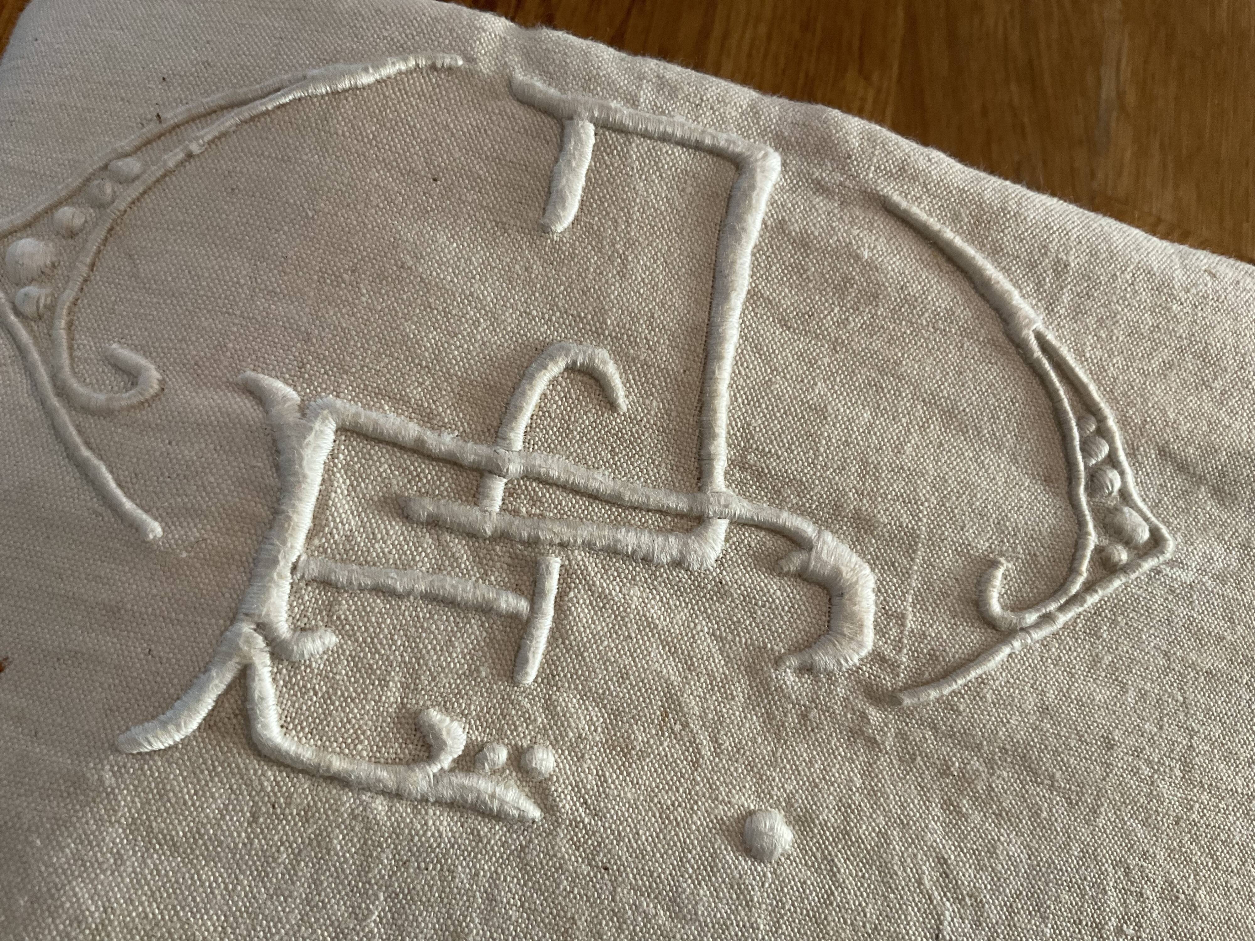 Old embroidered sheet, ec monogram
