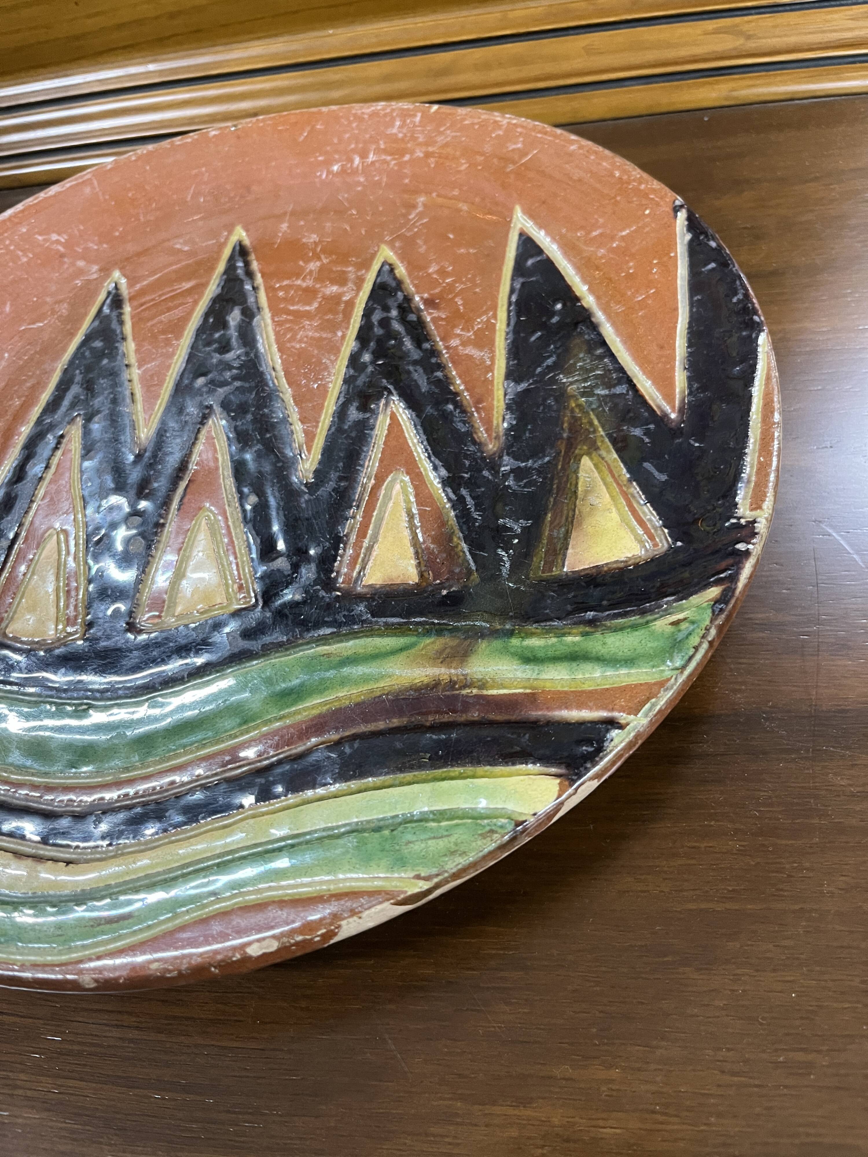 Large ceramic dish by Giraud Biot