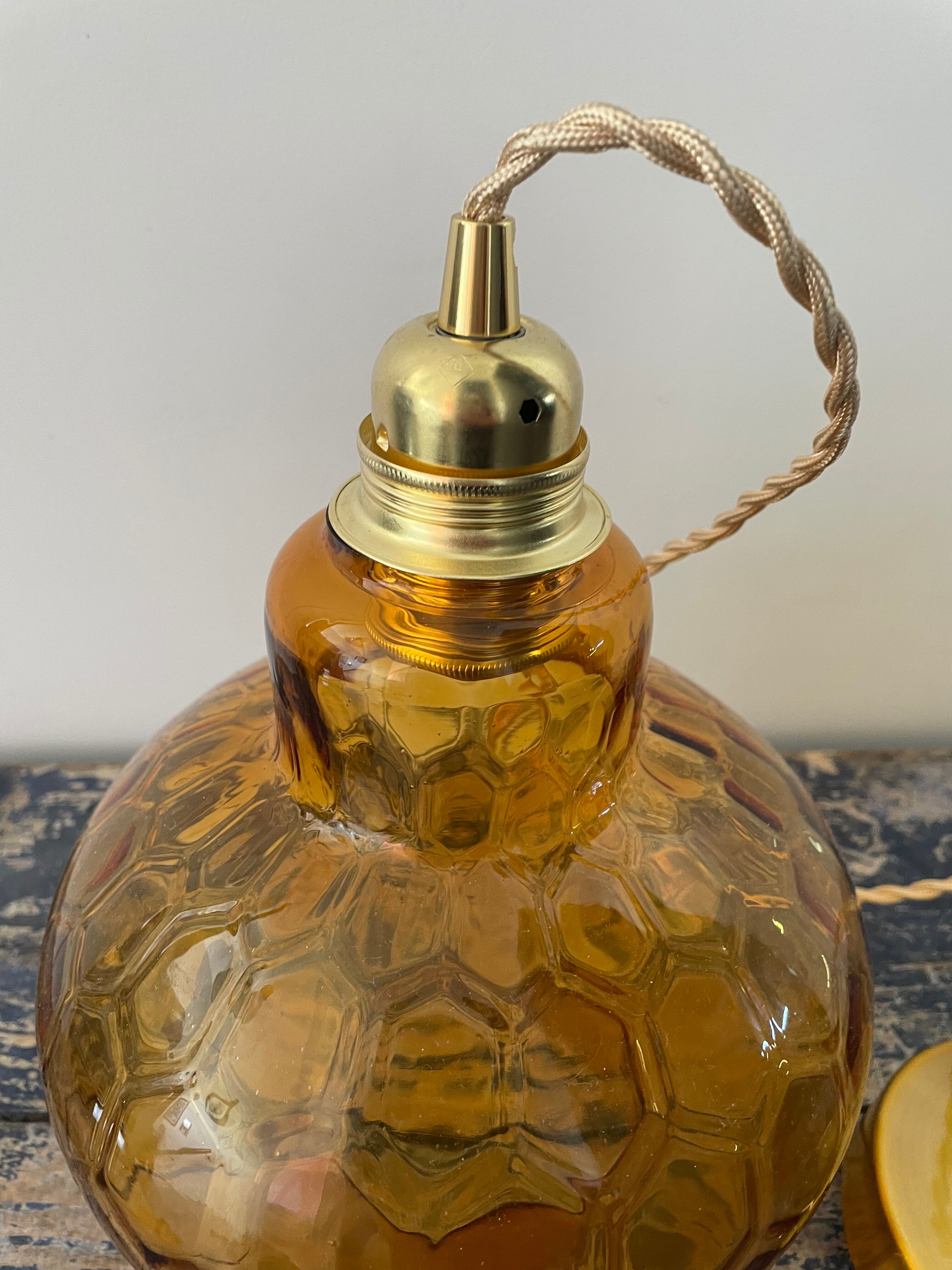 Vintage suspension lamp in electrified amber glass to nine