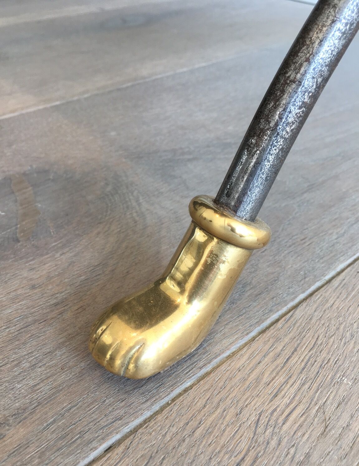 Coffee table in brushed steel and brass