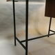 Bureau des années 50/60 en formica noir, acajou, doré