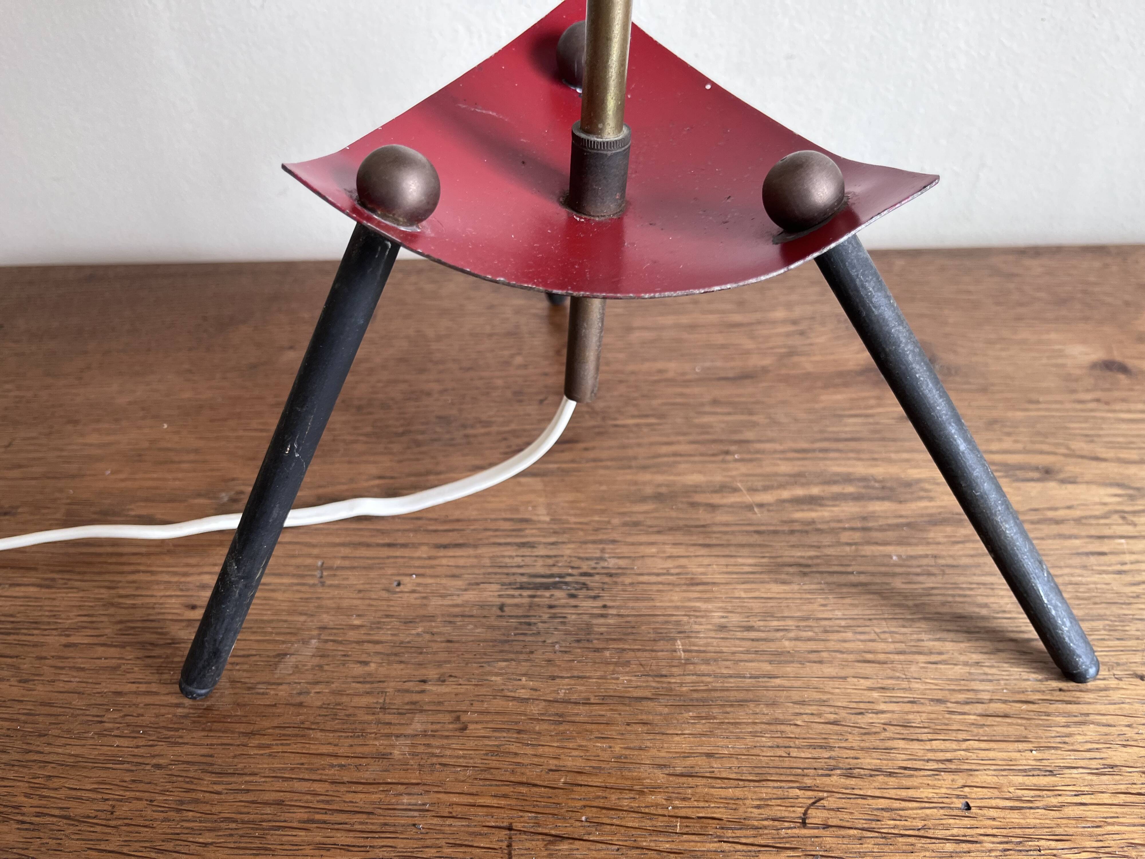 1950s modernist tripod lamp made of sheet metal and brass.