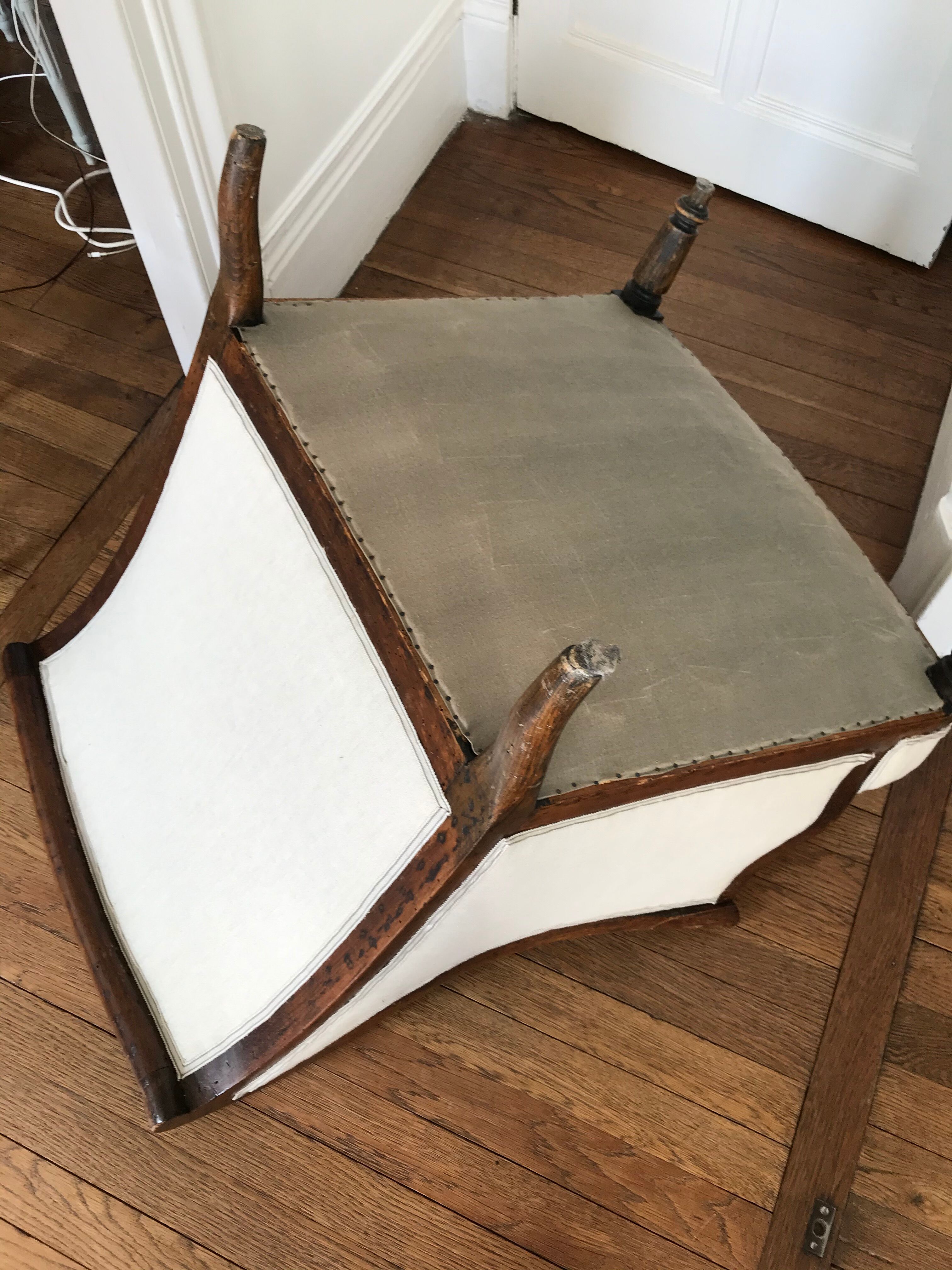 Original old armchair covered linen