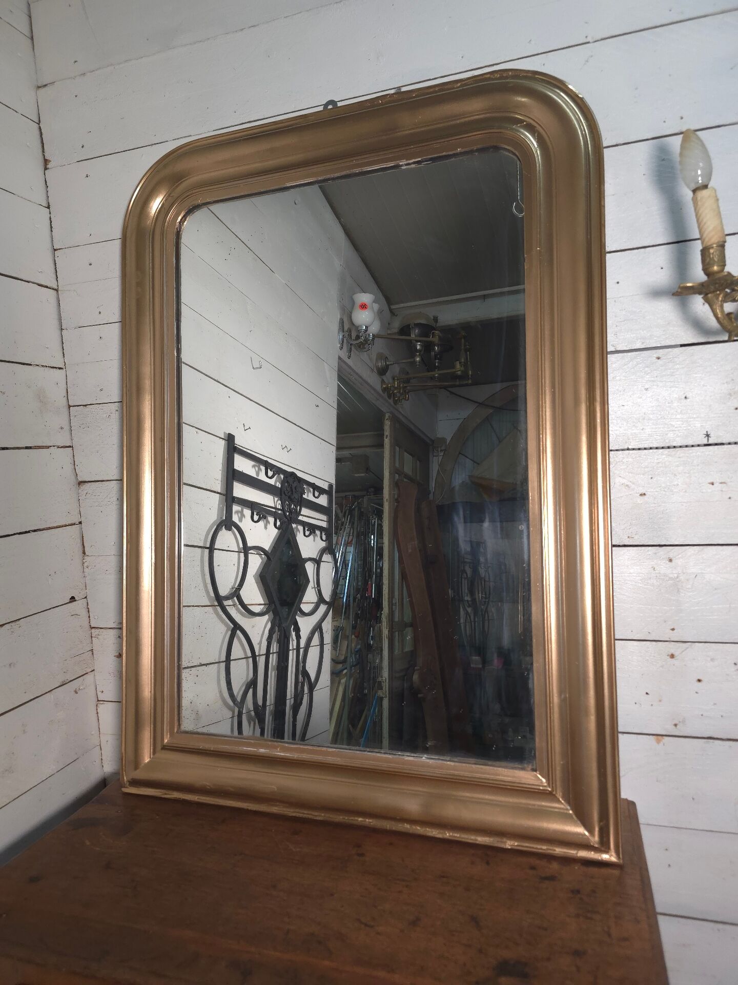Golden mirror in Louis Philippe style