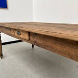 Antique farm table from the 1950s, with 3 drawers and turned legs