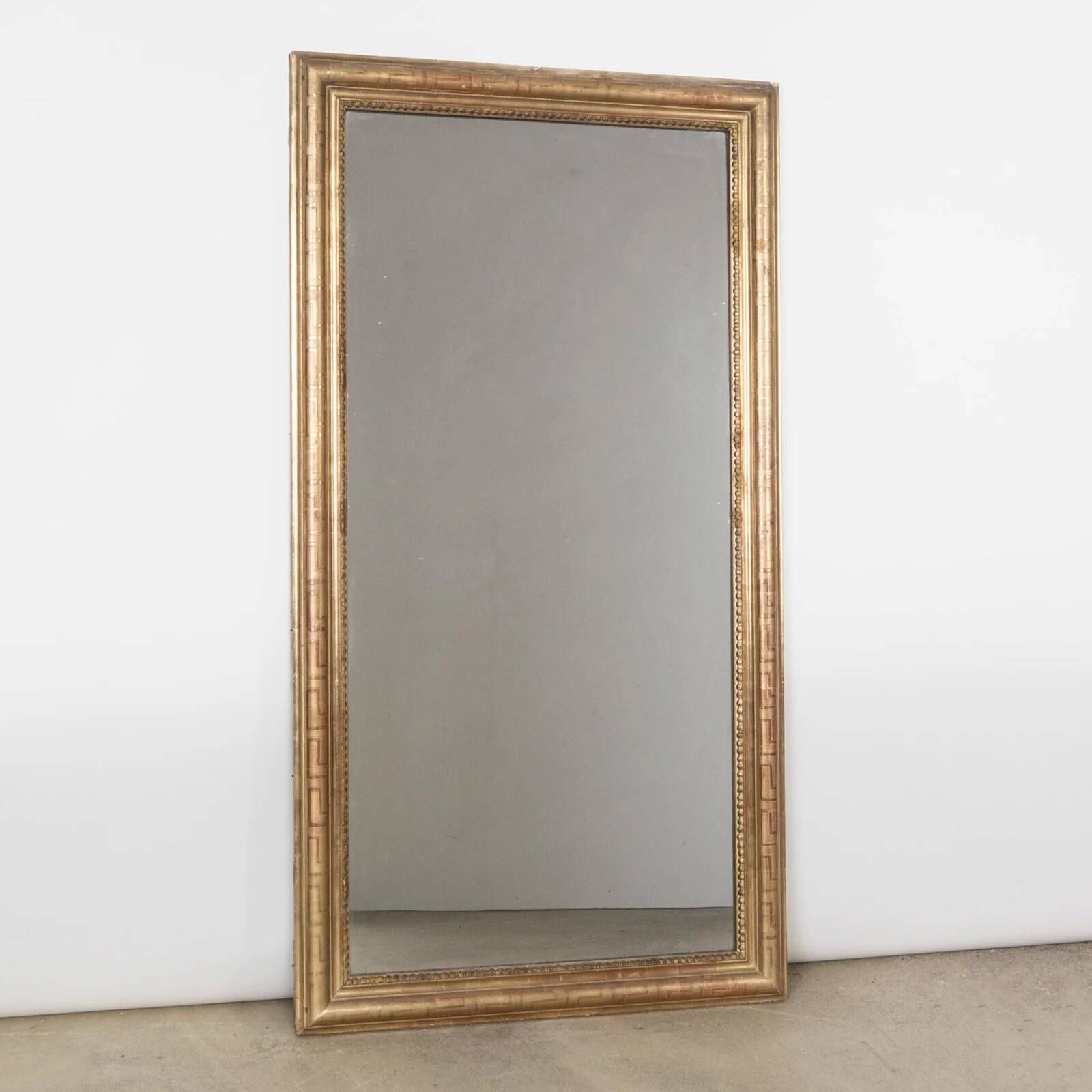 Nineteenth-century rectangular mirror with geometric pattern.