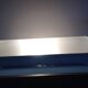 Rectangular porthole wall light in industrial/70s style frosted glass