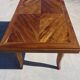 Antique solid walnut table with marquetry and extensions.