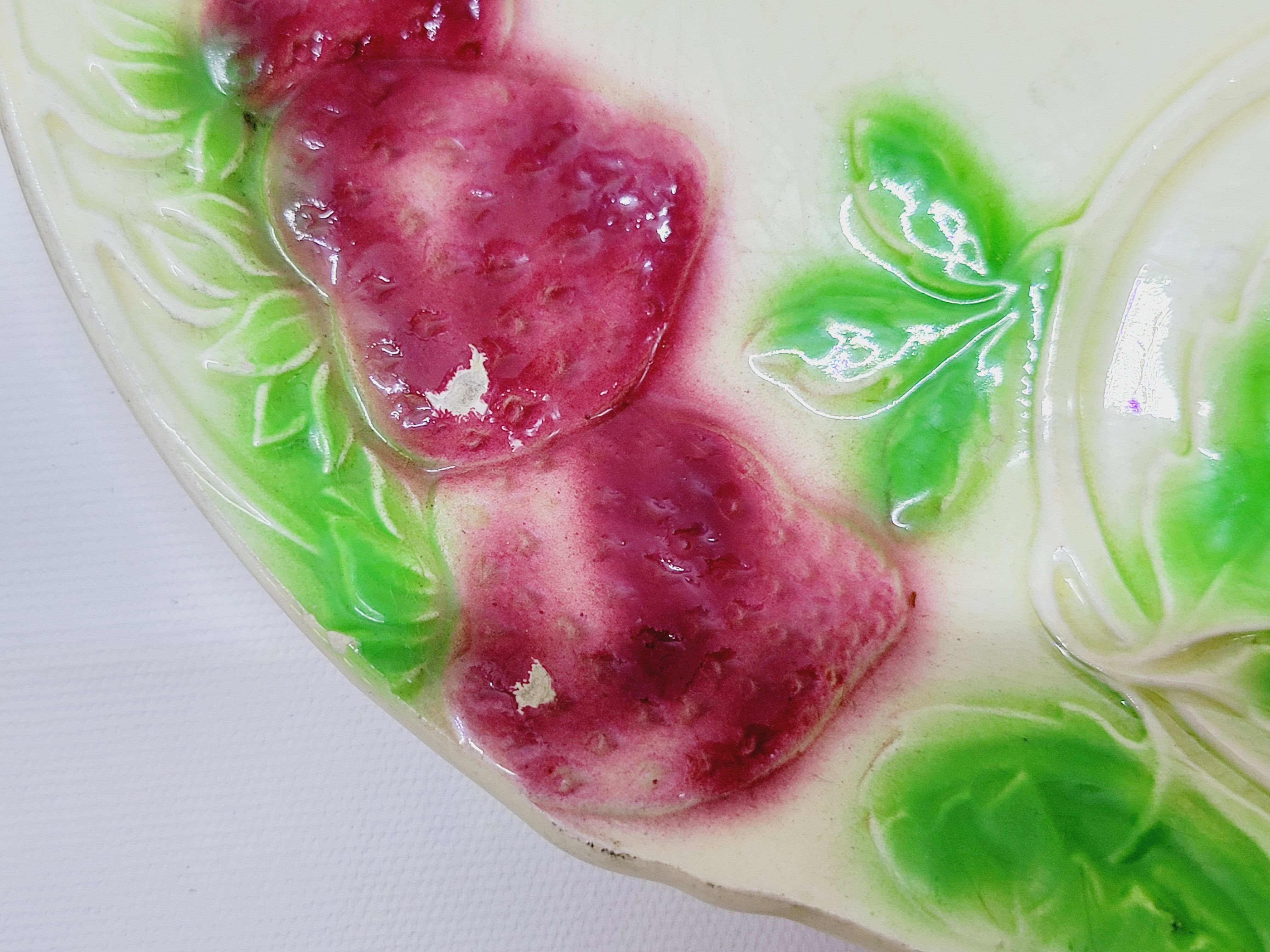 3 old plates in slip decoration strawberries and grapes