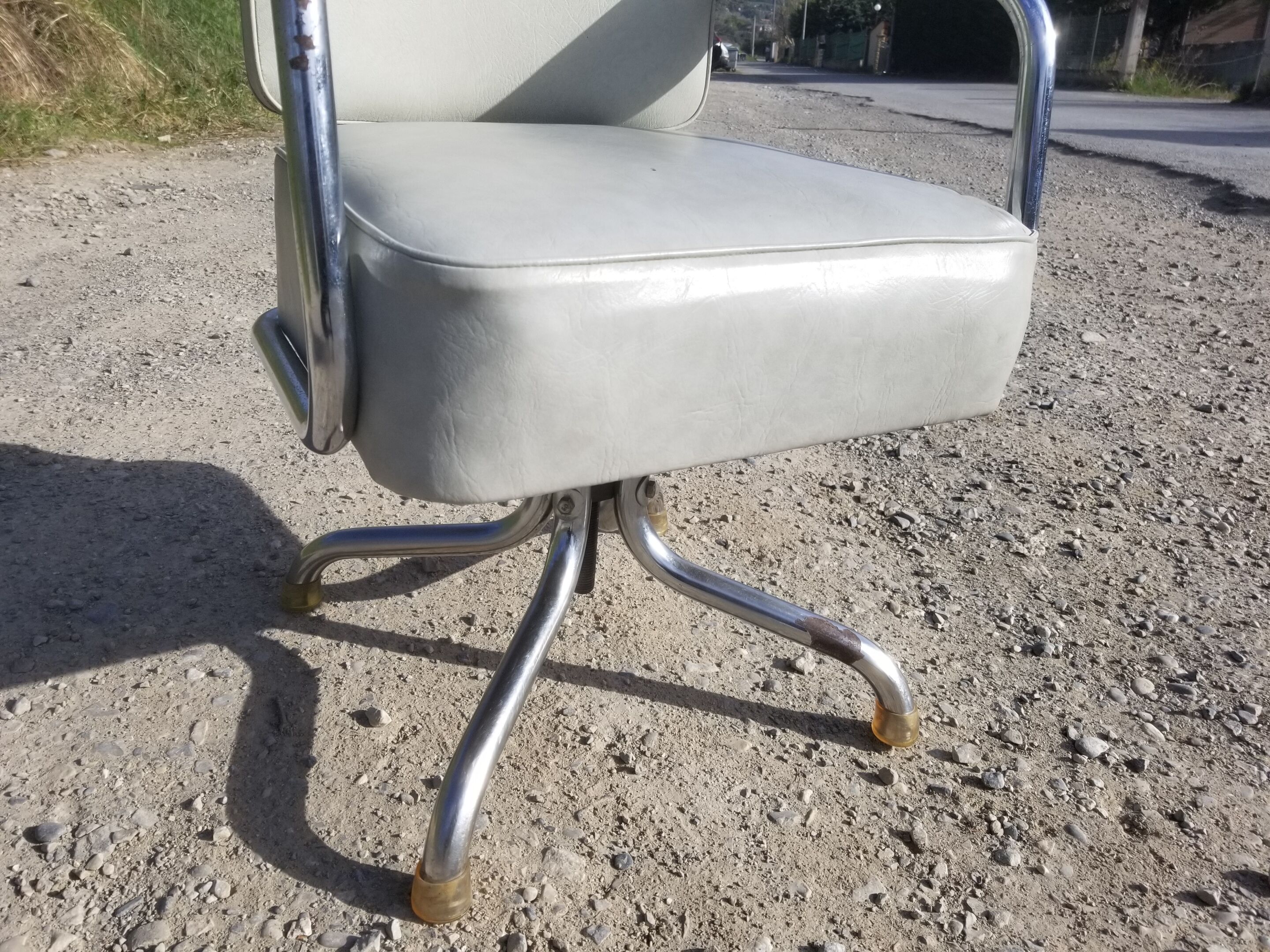 Old light grey pullman swivel office chair