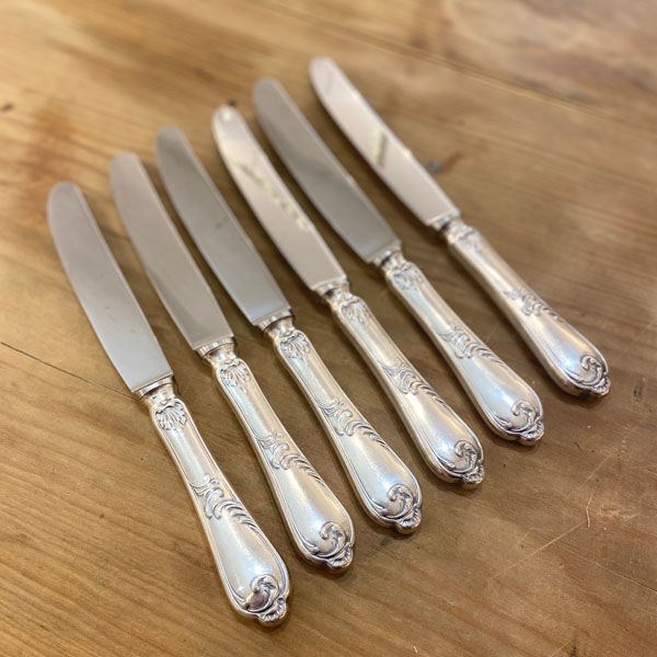 Series of 6 silver metal knives