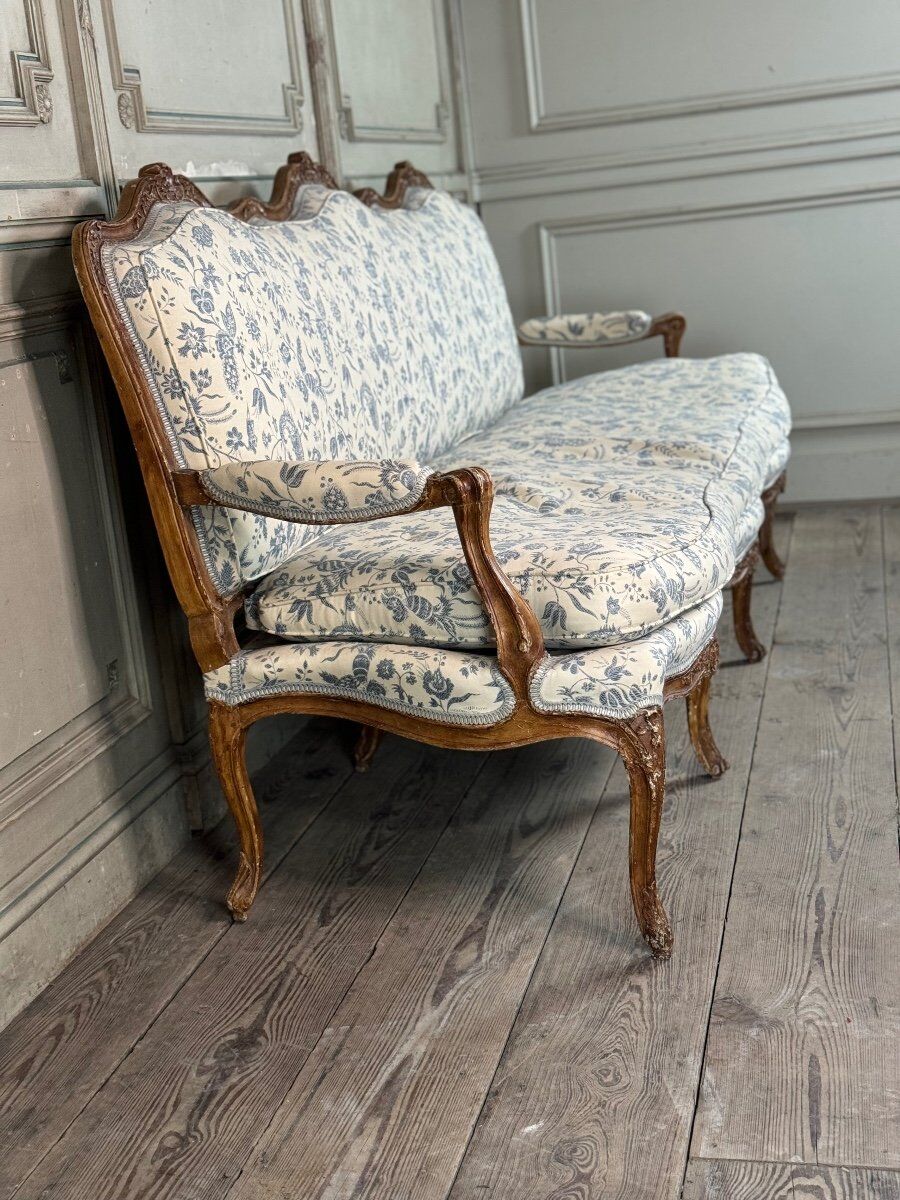 Louis XV bench in carved wood with oak patina, 18th century