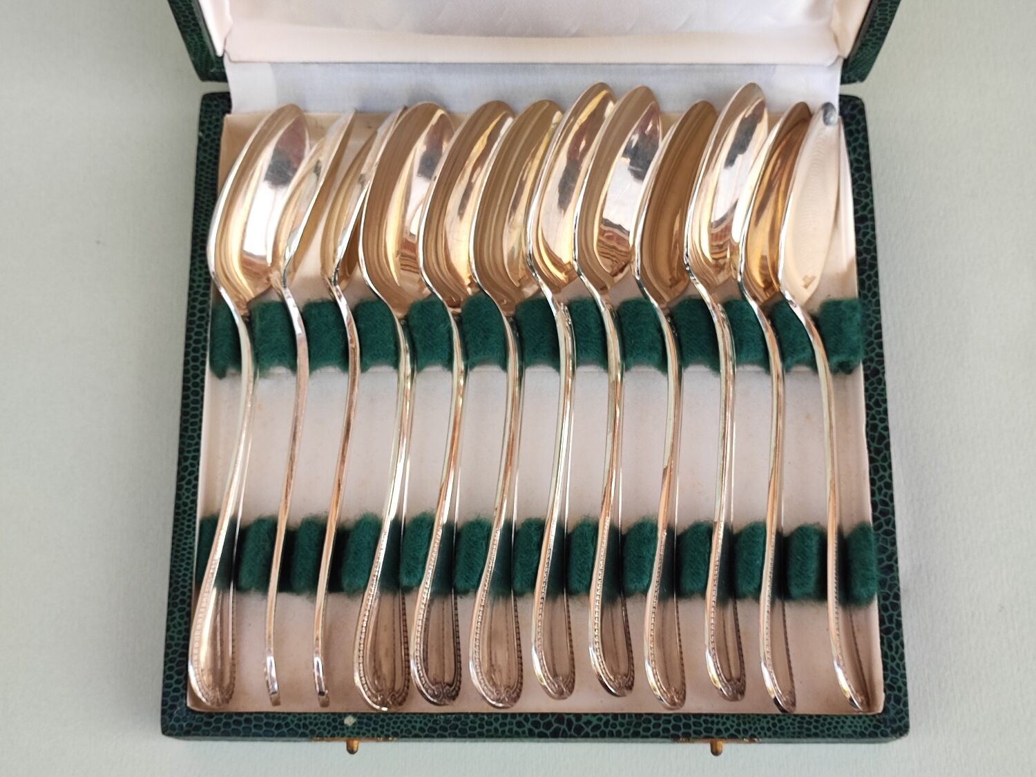12 Christofle dessert spoons