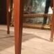 Nightstand with veneer and 4 drawers.