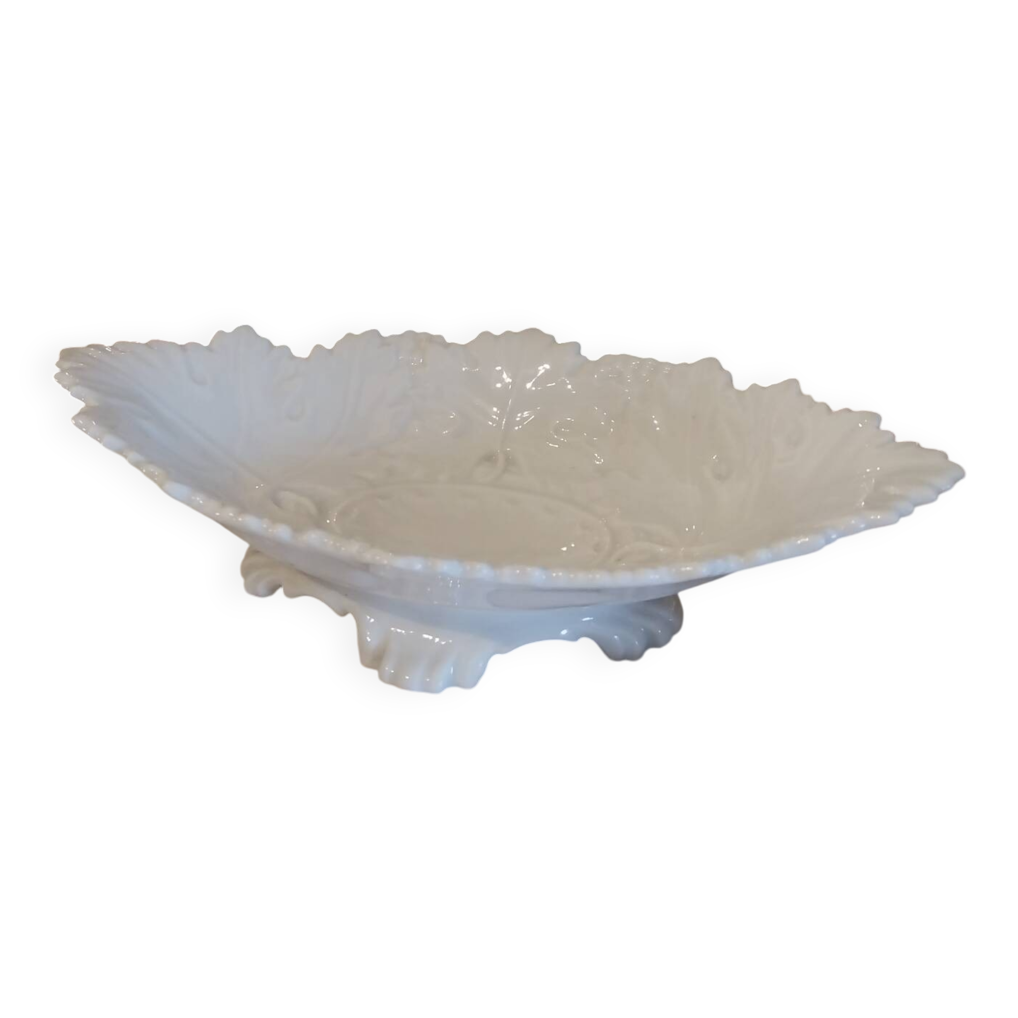 Old footed dish in slipware