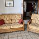 2-SEATER CHALET-STYLE SOFA AND ARMCHAIR, Jacques LELEU Collection