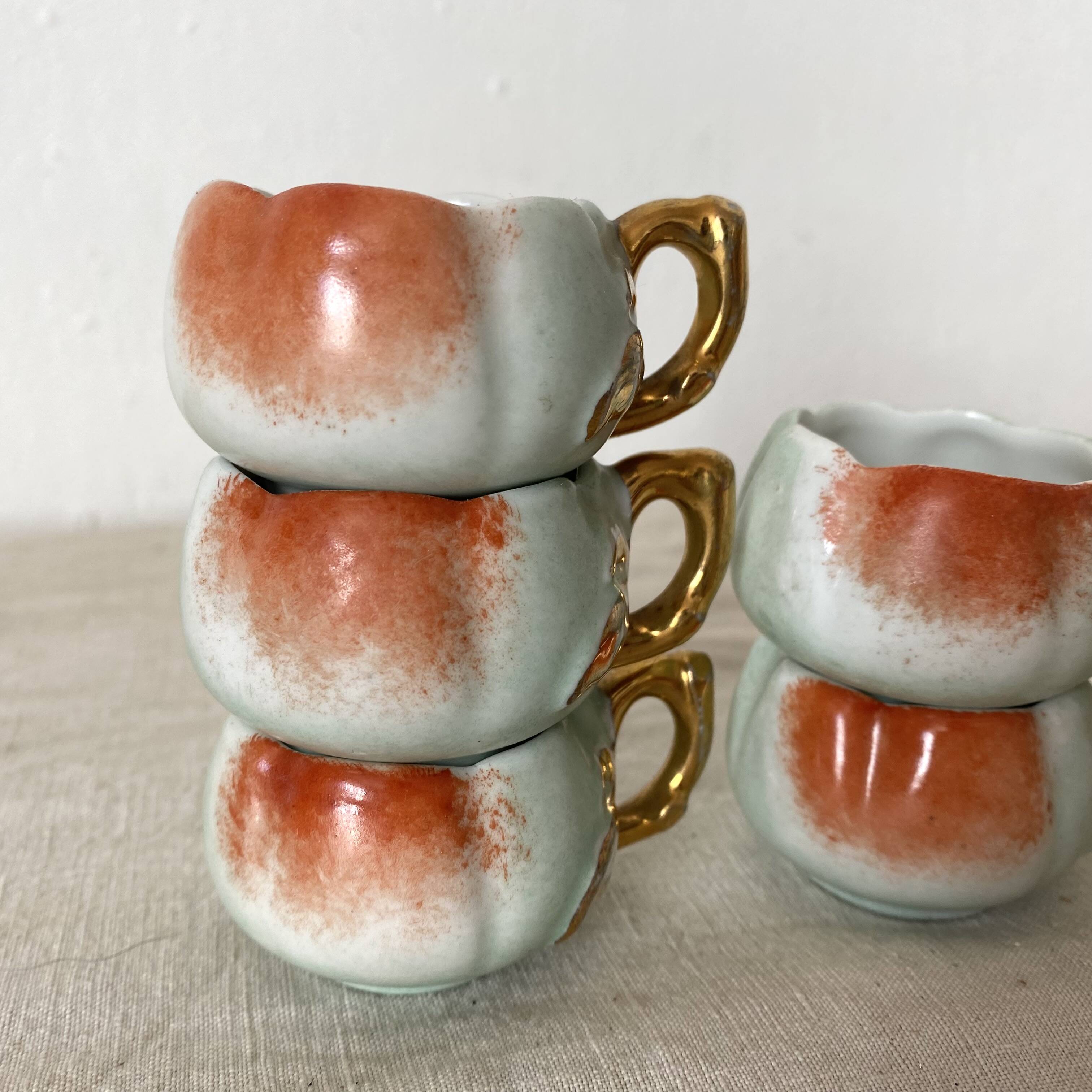Calvados liqueur cups in slip, 1940s