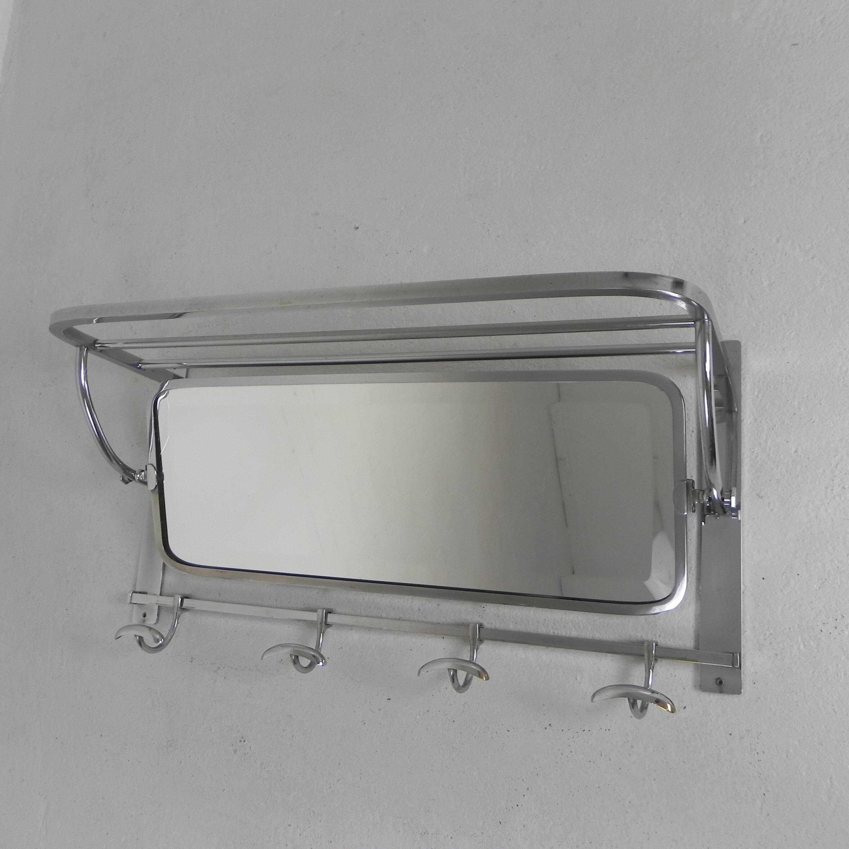 Art Deco wall coat rack with a bevelled mirror adjustable in a chrome frame, 1930s.