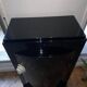 Curved black lacquered furniture signed assouline and dated 1987.