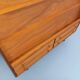 Vintage wooden display bookshelf with drawers from the 1960s.