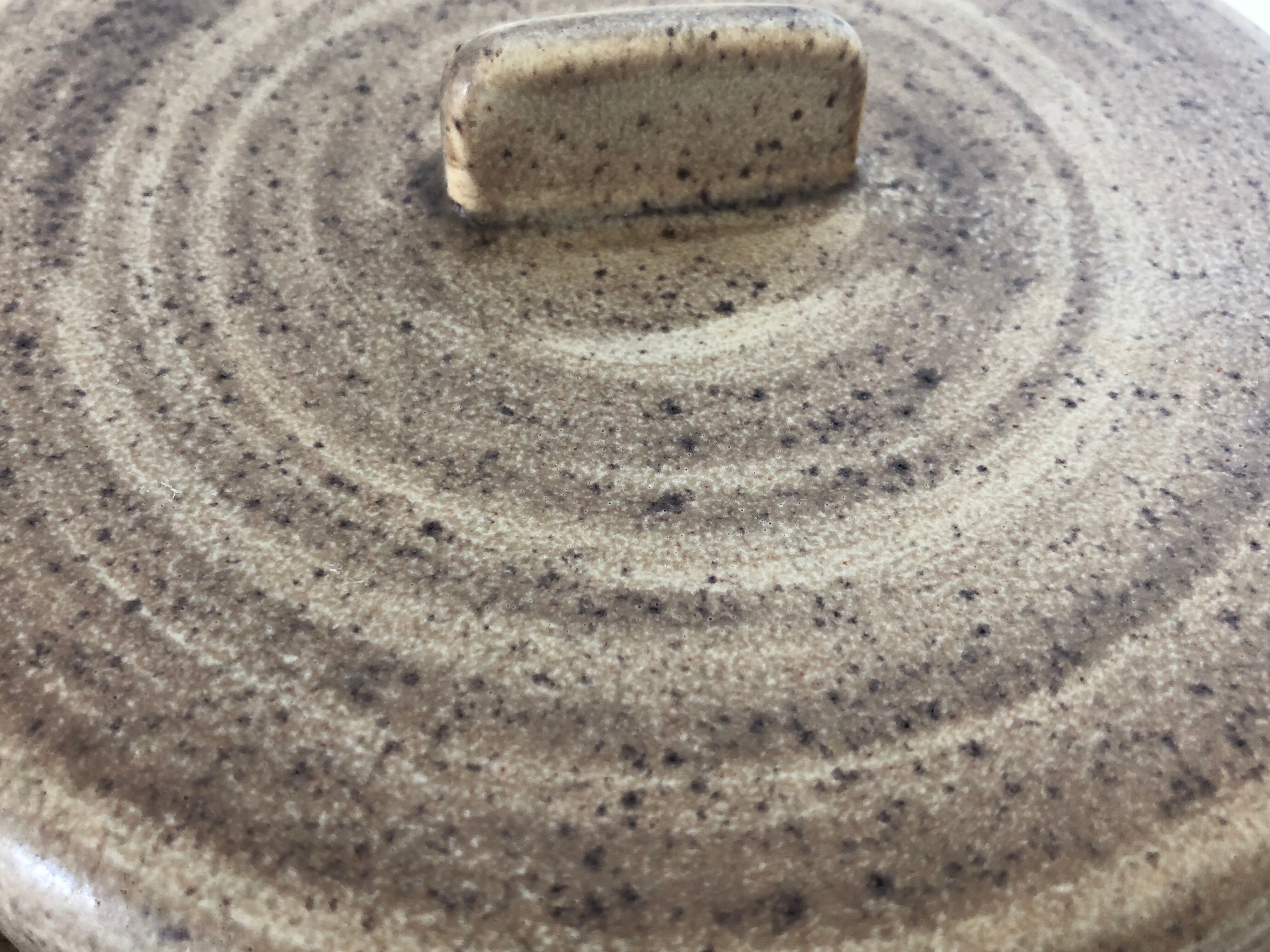 Dish with Bell in speckled sandstone