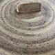 Dish with Bell in speckled sandstone