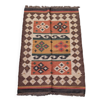 Tapis kilim en toile de jute et coton. 125cm x 195cm