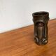 Abstract vase with a brutalist bronze face from the mid-century.
