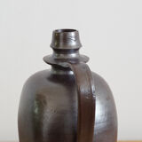 Old Norman bottle in brown ceramic
