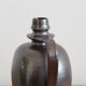 Old Norman bottle in brown ceramic