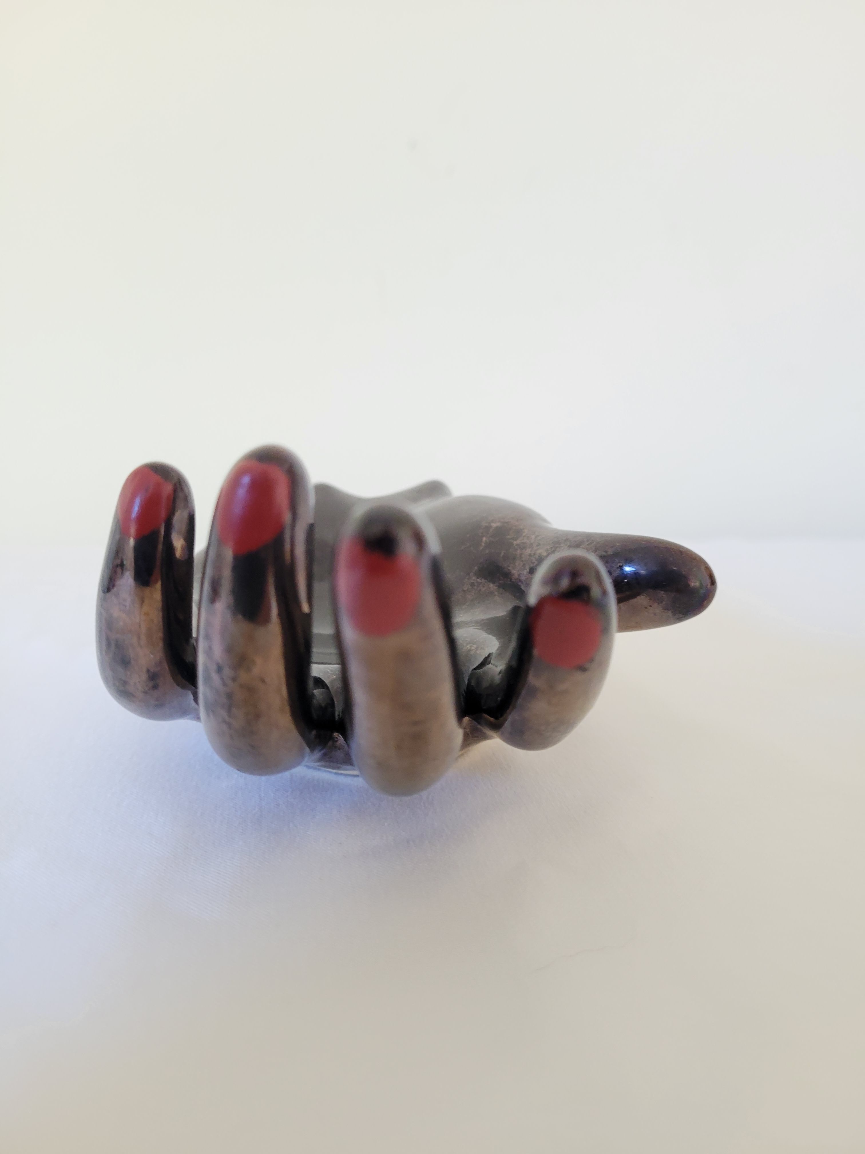 Empty pockets in the shape of a hand