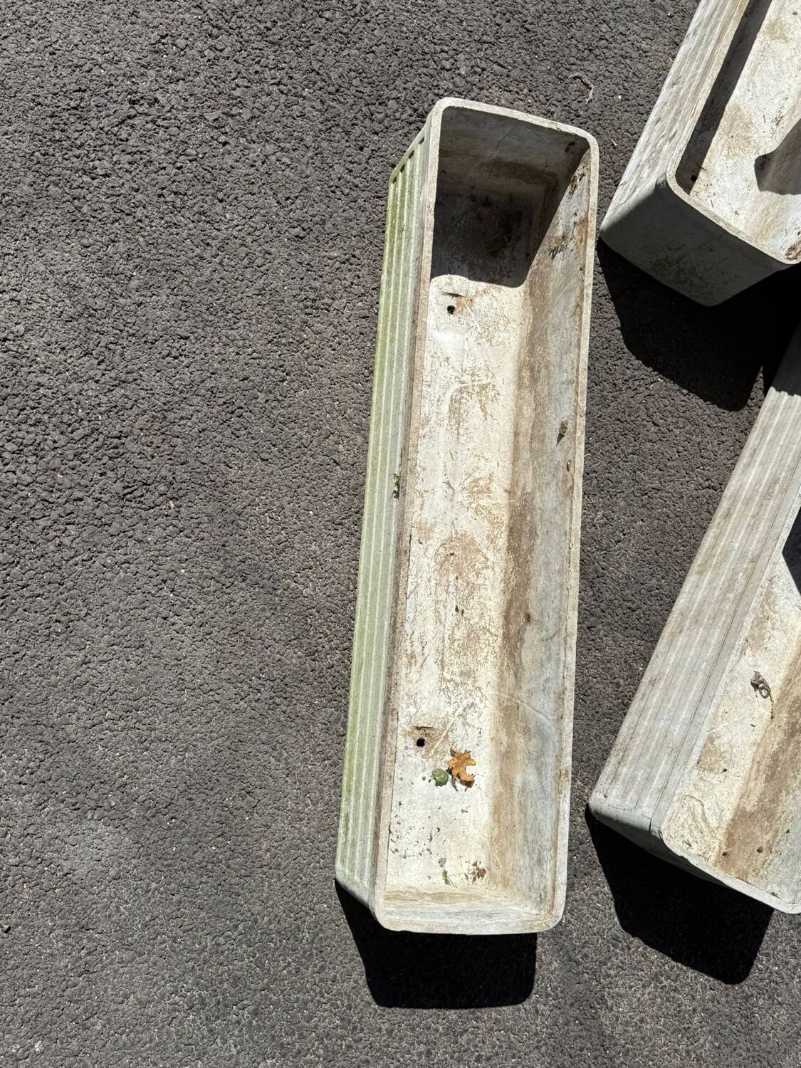 Set of 4 fibreglass planters by Willy Guhl