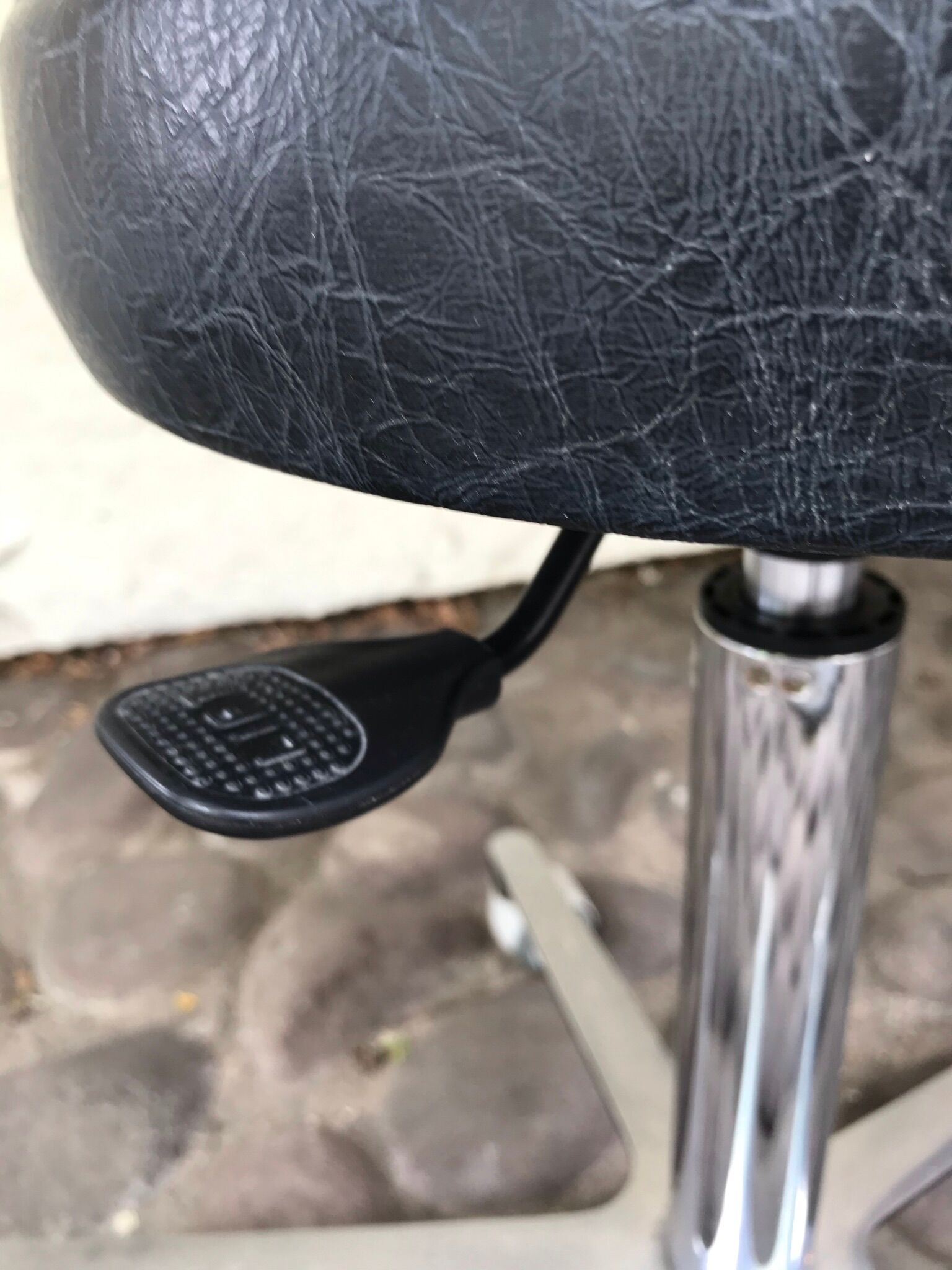 Stool on metal stand in star on wheels sitting round padded skaï bluish