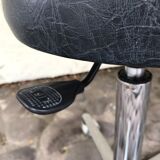 Stool on metal stand in star on wheels sitting round padded skaï bluish