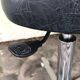 Stool on metal stand in star on wheels sitting round padded skaï bluish